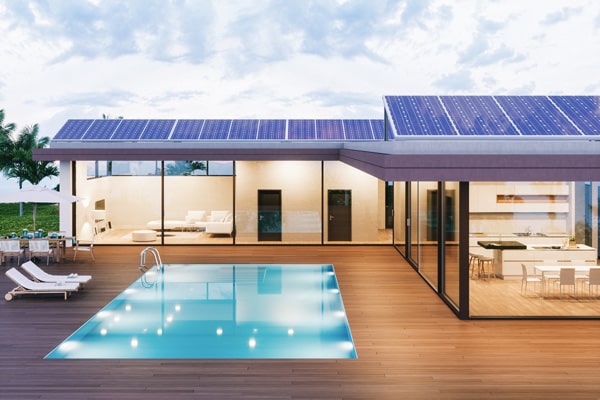 home with solar panels, glass walls and pool