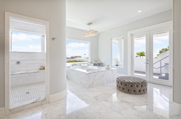 expansive marble master bathroom